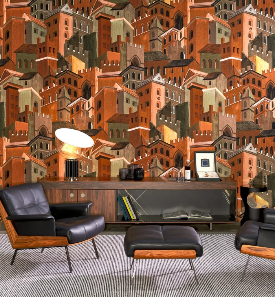 Arte Città di Castello: orangefarbene Häuserlandschaft hinter schwarzen Ledersesseln und einem Sideboard.