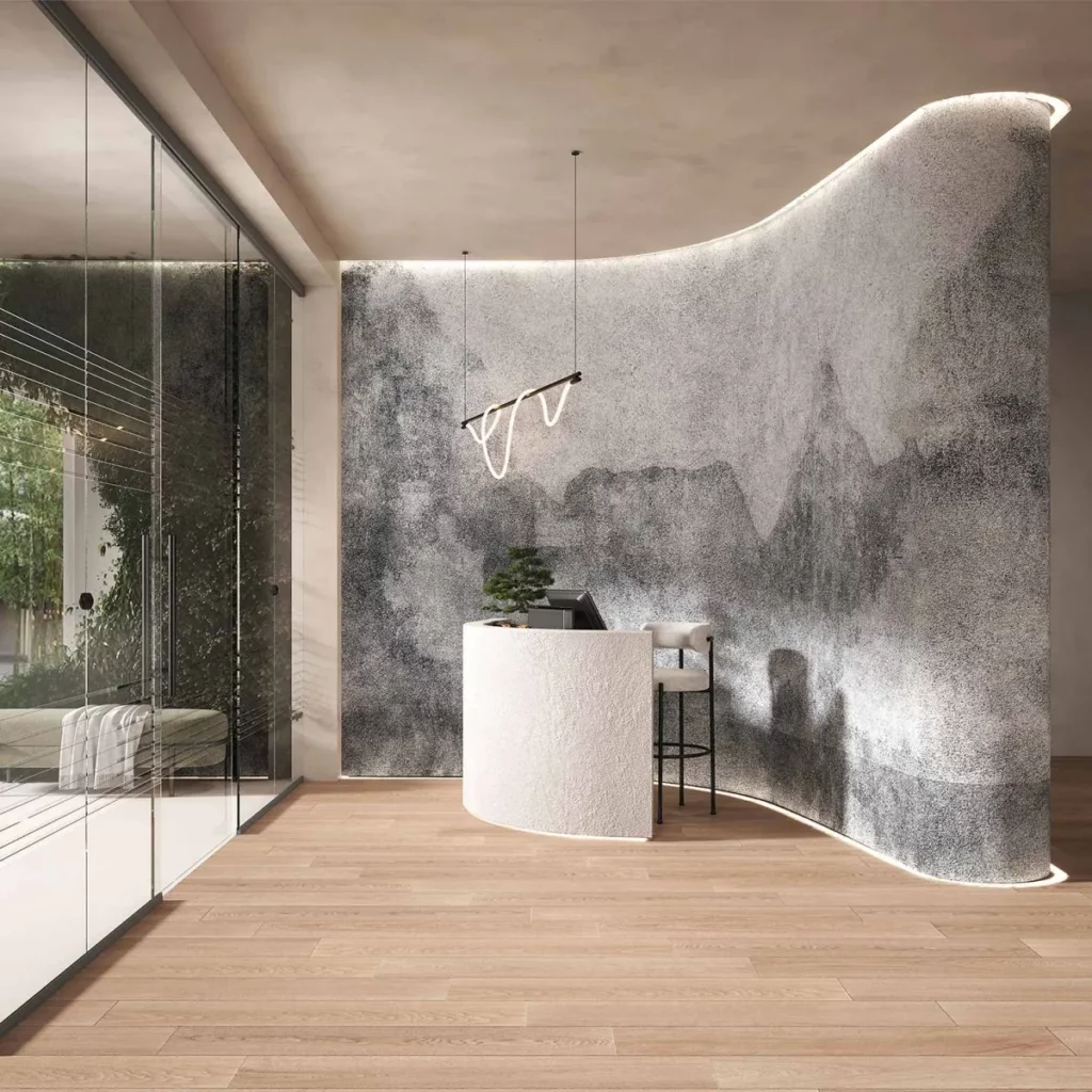 Cement Landscape von Tecnografica: abstrakte graue Landschaft mit weichen Konturen hinter einer geschwungenen Theke.