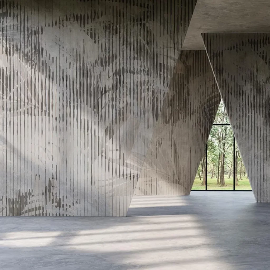 Leafcode von Tecnografica: graugrünes Blattmotiv und feine senkrechte Linien in einem hohen, offenen Raum.