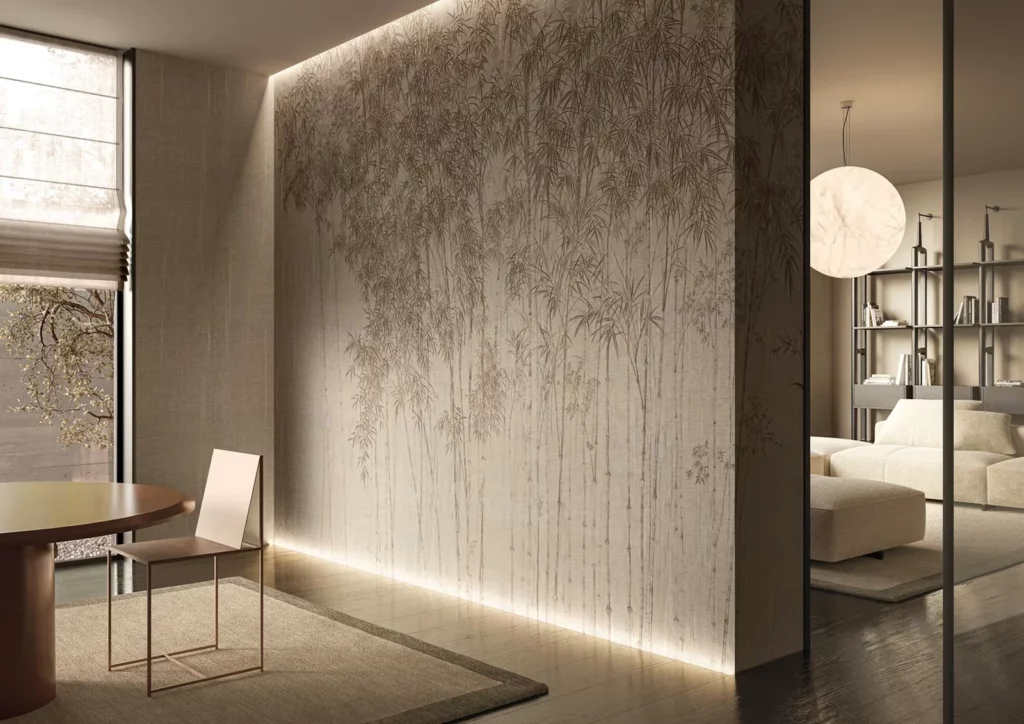 Chiaroscuro von Glamora: Fein gezeichnete Pflanzen mit langen schmalen Blättern an einer indirekt beleuchteten Wand.